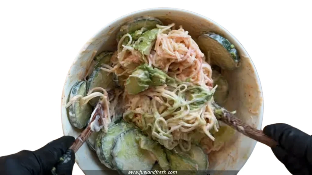 California Roll Cucumber Salad: Easy Fresh Sushi Flavors in a Bowl 9 Mixing California roll cucumber salad ingredients